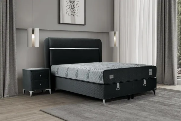 modern bedroom interior with bed and nightstand Hypnos ottoman bed