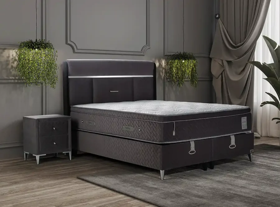 modern bedroom with bed and nightstand Silverline ottoman
