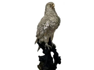 gold big eagle on branch