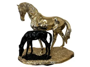 Gold horse with black colt