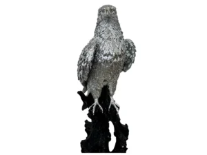 Silver big eagle on branch
