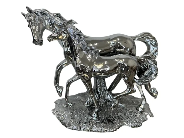 silver standing horse with cold