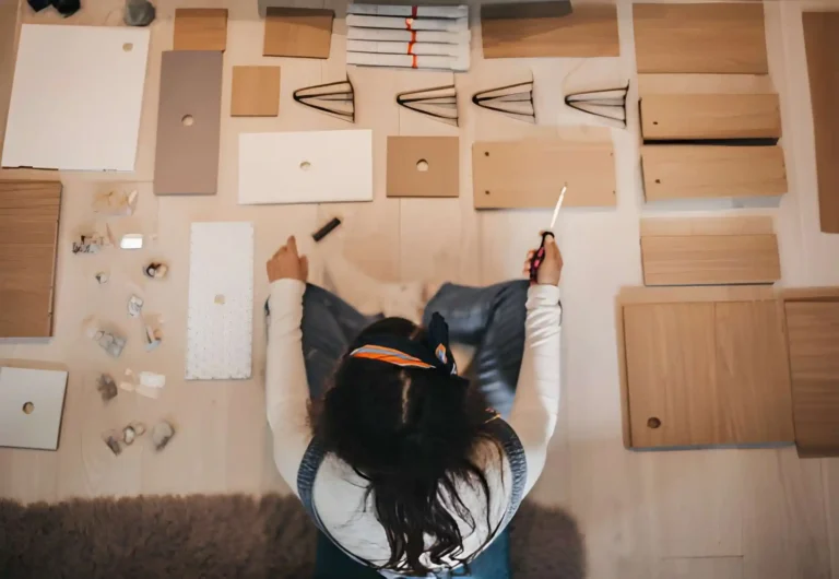 woman trying to assemble ikea furniture